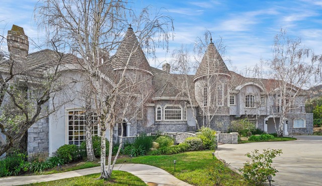 Castle style house with tennis court and pool in Los Angeles
