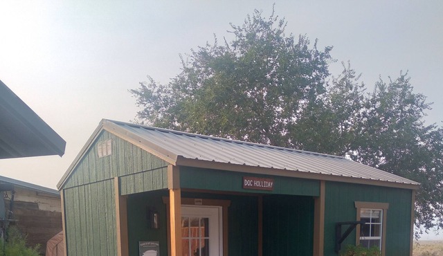 Doc Holliday, has a double bed, sleeps 2 and has a detached private bathroom.