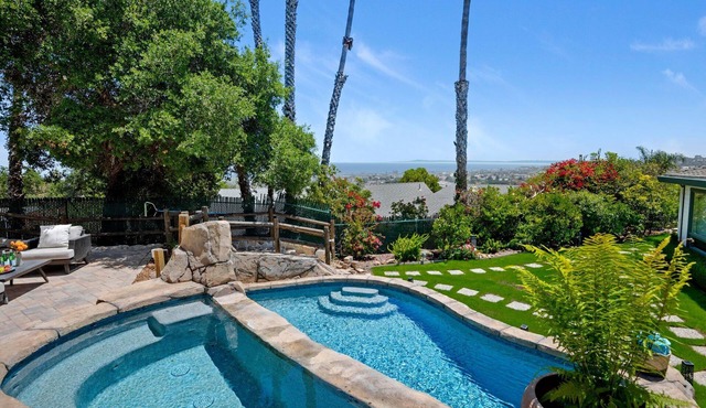 Elevated and Chic Riviera Home with Stunning City & Ocean Views!