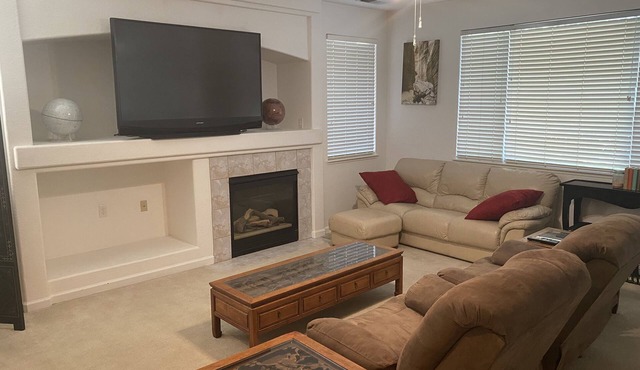 Fully-furnished home with private back yard in quiet, safe suburban neighborhood