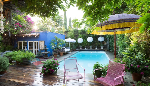 Lounge by the pool at a Zen Oasis in Trendy Miracle Mile