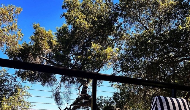 Mins to beach, mountains & park. Enjoy hot tub, fire pit, outdoor shower + more!