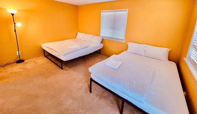 Private Room [#2] - King & Queen Beds - Shared Bathroom