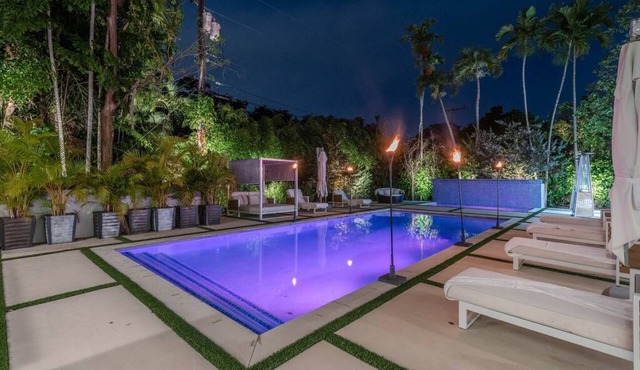 Secluded and Modern Lux Miami Villa w/Waterfall Pool in Coral Gables