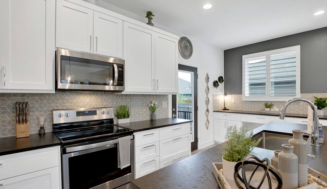 Soaring 2-level Point Venture Home on Lake Travis in Leander
