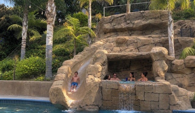 Spacious 6 Bedroom Vacation Home with Waterslide & Heated Saltwater Pool in San Diego