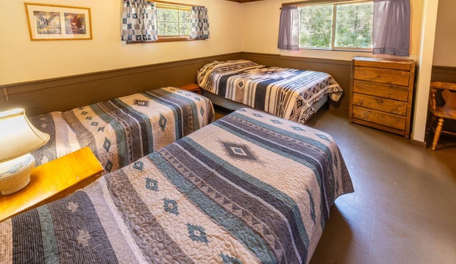 Step Back in Time: Historic 1912 Riverside Cabins at Camp Layman