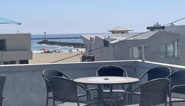 Steps to the Beach with Rooftop Patio View