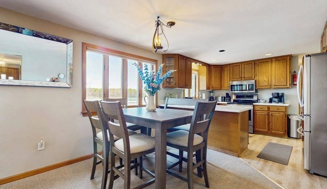 Tranquil waterfront home with stunning views, a spacious deck, and a BBQ grill in York Harbor