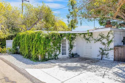 Vine-Covered Garden Suite | Queen + Patio
