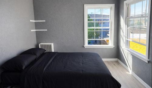 Queen Room with Shared Bathroom