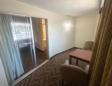 Suite with Three Queen beds