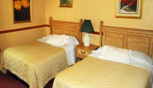 Queen Room with Two Queen Beds with Garden View