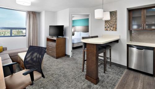 One-Bedroom King Suite with City and Mountain View
