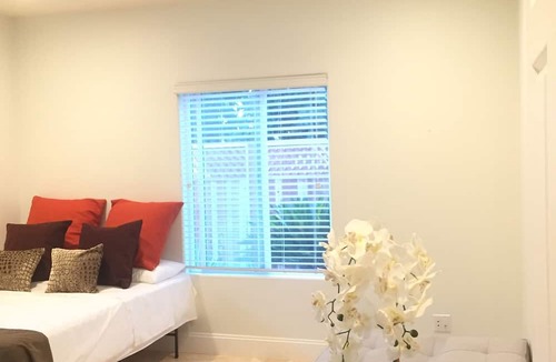 West Covina House | The PEACOCK suite next to a country club