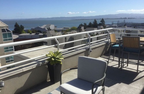 North Beach Condo | WATERFRONT PENTHOUSE. SPECTACULAR VIEWS, DECKS, PRIVACY, QUIET, PARKING, GYM.