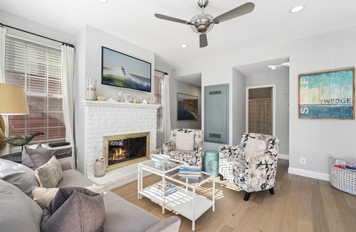 West Newport Condo | Newly renovated Duplex steps to the sand 3bd/3bath