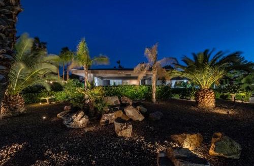 Canyon Gate Villa | Luxury Villa, with bonus pool house, Private Pool, Hot tub, rock water fall and slide, putting green, basketball, shuffle board, play gym, privately gated on circular driveway.